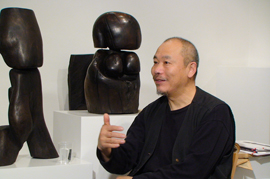 Interviewing Wang Keping at 10 Chancery Lane Gallery in Hong Kong, 28 March 2009.