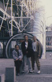 Photograph of <i>(left to right)</i> Huang Yongping, Gu Dexin and Yang Jiechang, taken outside of Centre Pompidou, 1989.