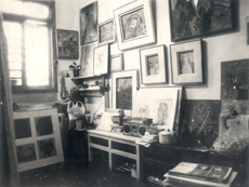 Photograph of Zhang Xiaogang at his Congqing studio, taken in 1987.